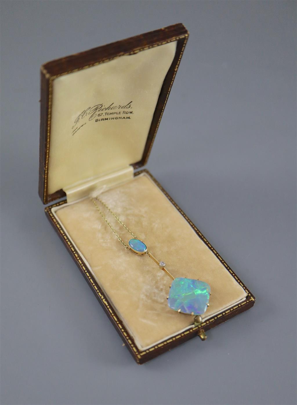 An early 20th century 15ct gold, diamond and two stone opal set drop pendant necklace,